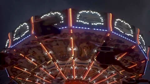 CARNIVAL SWINGS_RED LIGHTS Stock Footage 138480917