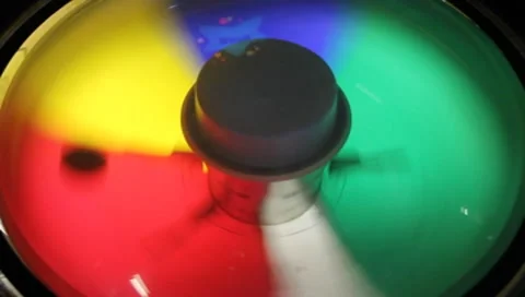 Carnival theme park games spinning color wheel Stock Footage