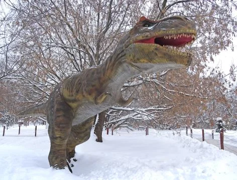 Carnotaur in the winter forest. Stock Photos