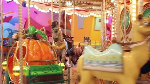 The carousel at the amusement park Stock Footage 69936795