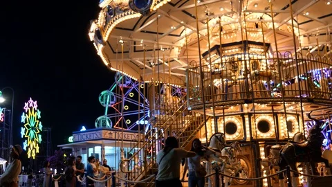 Carousel in amusement park Stock Footage 119789123