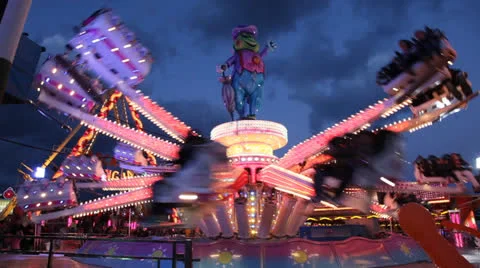 Carousel in amusement park at night Видео 23721429