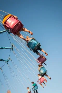 Carousel in amusement park Stock Photos