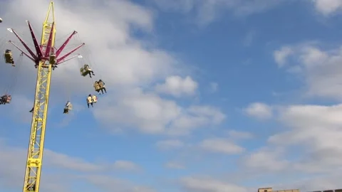 Carousel, attraction high against the sky. Stock Footage 147114570