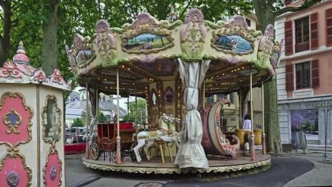The carousel for children in the square in Chambery Video stock 159990838