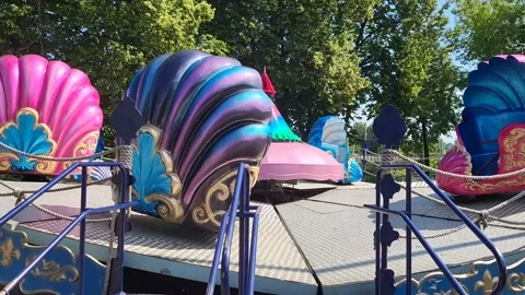 Carousel in the children's park Stock Footage 233915640