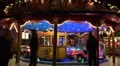 Carousel at Christmas fair panning shot HD Footage