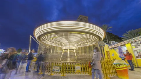 Carousel Fair in Amusement Park Night Timelapse 4K Stock Footage 166006996
