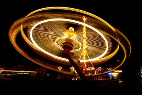 Carousel in funfair in motion Stock Photos