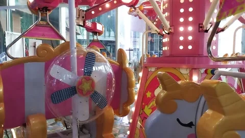 Carousel game machine. With a very cute horse. Colorful and flashing lights. Stock Footage 247913544