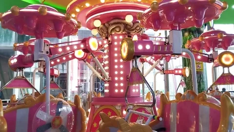 Carousel game machine. With a very cute horse. Colorful and flashing lights. Stock Footage 247913545