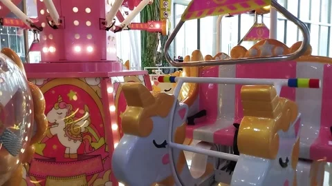 Carousel game machine. With a very cute horse. Colorful and flashing lights. Stock Footage 247913673