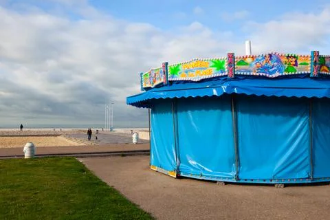 Carousel for Kids on the empty beach in Le Havre. 스톡 사진