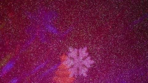 Carousel of light rays of different colors. Flying colored silhouettes Stock-Footage 202040963