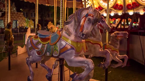 Carousel lights at night focus on horse Stock Footage 32168266