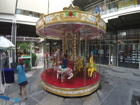 Carousel at the mall Stock Footage 72534675