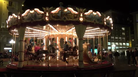 Carousel (Merry-Go-Round) illuminated at night Stock Footage 146727723