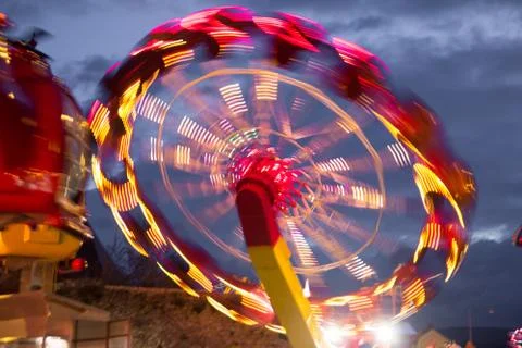 Carousel in night lights blur motion Stock Photos