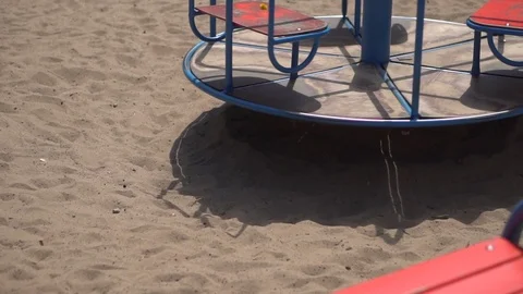 Carousel on the playground on a sunny day Stock Footage 108395502