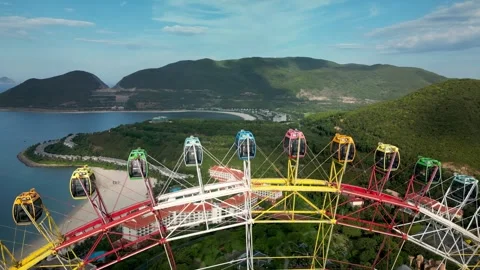 Carousel ride is fun and entertaining in an amusement park against the backdrop Stock Footage 250101213