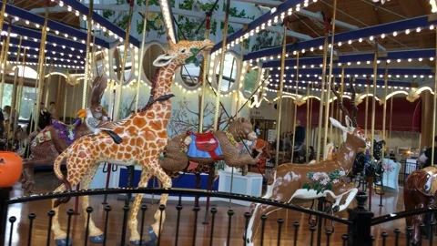 Carousel, Roundabout or Merry-Go-Round with Colourful Retro Vintage Wooden S Video stock 140556451
