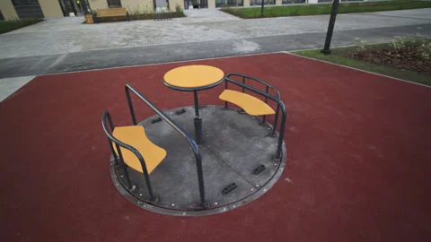 Carousel with seats and table installed on playground area Vídeos de archivo 330282973