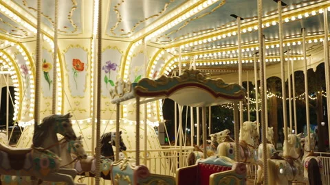 Carousel spinning in the park Видео 199679210