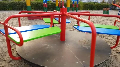 Carousel spinning on the playground Video stock 80954128