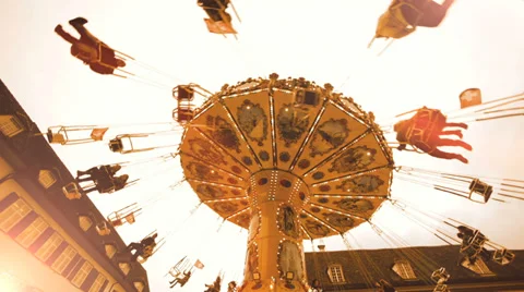 Carousel. swing ride. spinning. carnival. amusement park. activity fun Stock Footage 33693347