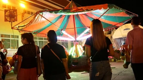 Carousel in Thai temple fair Stock Footage 120416943