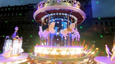 Carousel turns in the shop window Stock Footage 100387951