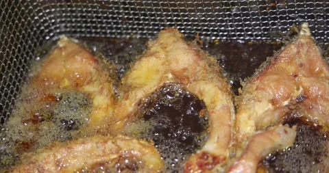 Carp fish in the fryer Stock Footage 194576972