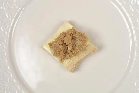 Carp Roe with Garlic on a Piece of Bread Stock Photos