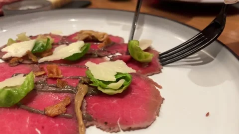 Carpaccio fork knife of Beef with Roasted Baby Beets creamed Horseradish Stock Footage 295066265