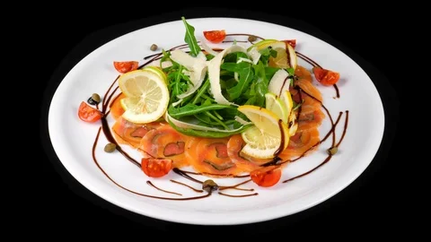 Carpaccio salmon, dish with thinly sliced raw fish meat Stock Footage 90656059