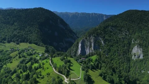 Carpathian Mountains, dramatic limestone cliffs of Zarnesti Gorges near Pestera Stock-Footage 324816455