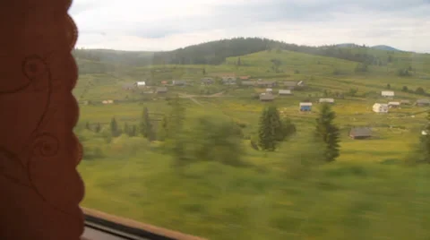Carpathian village from train window Stock Footage 36779014