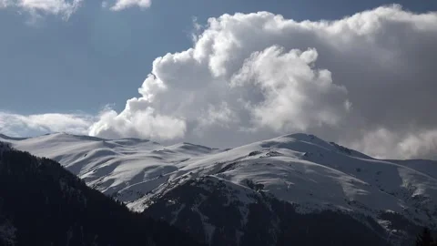 Carpathians mountain range stands under towering clouds - Mountain Panorama Stock Footage 339486915