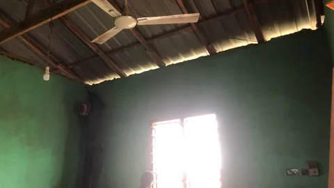 Carpenter Begins Ceiling Installation in Residential Room Stock Footage 315830671