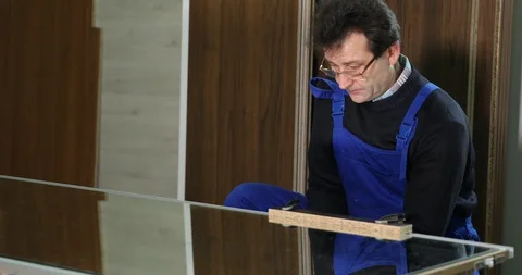 Carpenter Builder Man Working Disconnect Gripping System in Carpentry Workshop Stock Footage 85515671