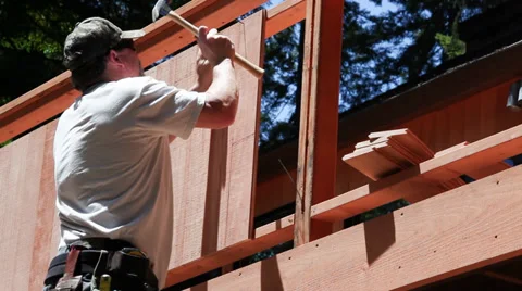 Carpenter building deck Stock Footage 39739011