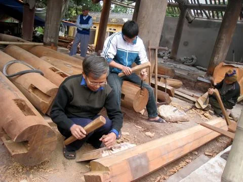 Carpenter building a temple Stock Photos