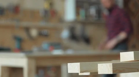 Carpenter in the carpentry workshop bokeh Stock Footage 61821806