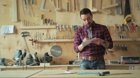 Carpenter in the carpentry workshop Stock Footage 61361126