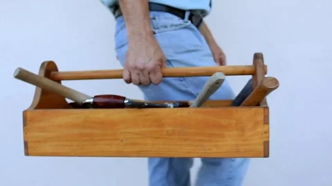 Carpenter Carrying Toolbox Stock Footage 80772997