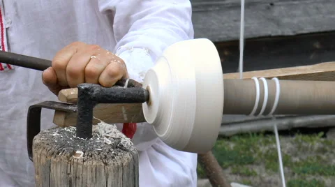Carpenter carves a cup Stock Footage 68189404