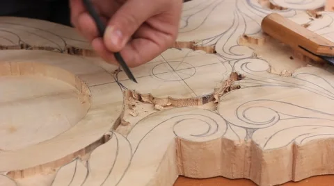 Carpenter carving wood with chisel Stock Footage 56030835