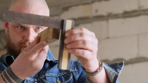 Carpenter Checks The 90 Degree Angle With Try Square. Try Square Carpenters Tool Stock Footage 156683505