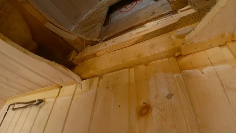 The carpenter chisels process the board. 4K. Video stock 88244028