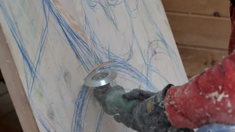 The carpenter creates a picture on a workbench, the hands of a wood carving Stock Footage 205610728